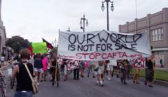 Protesters March Against CAFTA - click for info about CAFTA