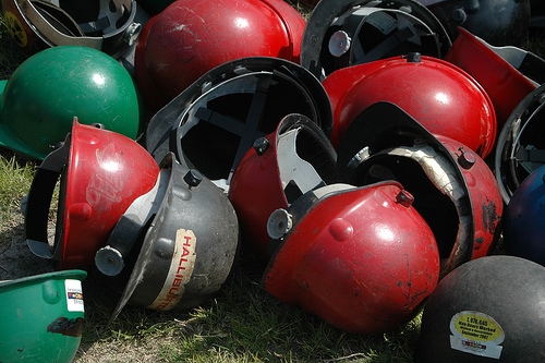 Workers leave helmet...